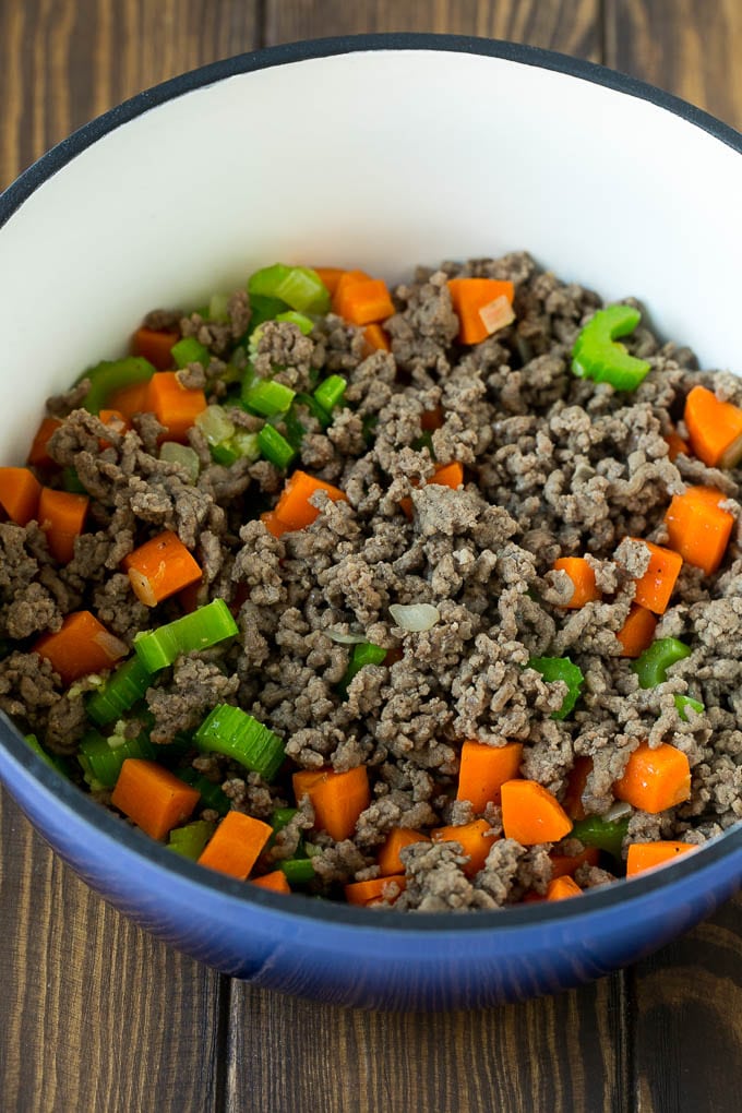 Alphabet Soup Recipe | Hamburger Soup | Beef and Vegetable Soup #soup #hamburger #noodles #dinner #uzhal #carrots Ground beef, carrots, onion and celery in a soup pot.
