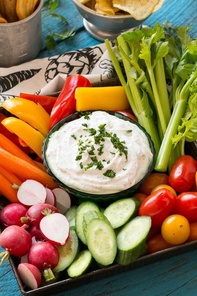 Homemade Ranch Dip Recipe | Homemade Ranch Powder | Homemade Ranch Dressing | Best Ranch Dip #ranch #dip #appetizer #snack #uzhal A bowl of homemade ranch dip surrounded by fresh vegetables.