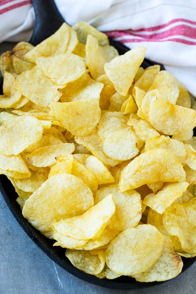 Irish Nachos Recipe | Potato Nachos | Potato Chip Recipe | Appetizer Recipe #nachos #potatoes #cheese #bacon #appetizer #uzhal Kettle chips in a skillet.