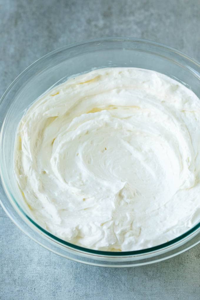 Cream Cheese Fruit Dip | Fruit Recipe | Fruit Dip #fruit #dip #creamcheese #snack #dessert #uzhal Cream cheese, marshmallow cream and whipped topping in a mixing bowl.