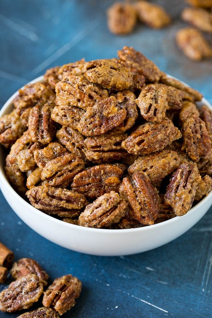 Candied Pecans Recipe | Glazed Pecans | Sugared Pecans #pecans #nuts #snack #dessert #uzhal A bowl filled with homemade candied pecans.