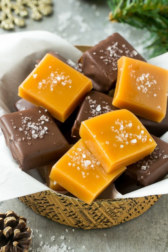 Microwave Caramels with Sea Salt Recipe | Homemade Caramels | Sea Salt Caramel | Homemade Candy #candy #caramels #caramel #microwavecaramels #homemade #dessert #uzhal A basket of microwave caramels topped with sea salt.