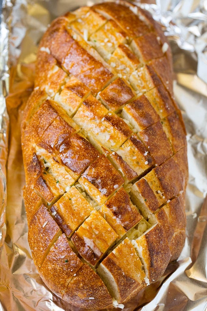 Pull Apart Bread | Garlic Bread | Cheese Bread #bread #garlic #cheese #sidedish #appetizer #uzhal Garlic butter and shredded cheese stuffed into a cut loaf of bread.