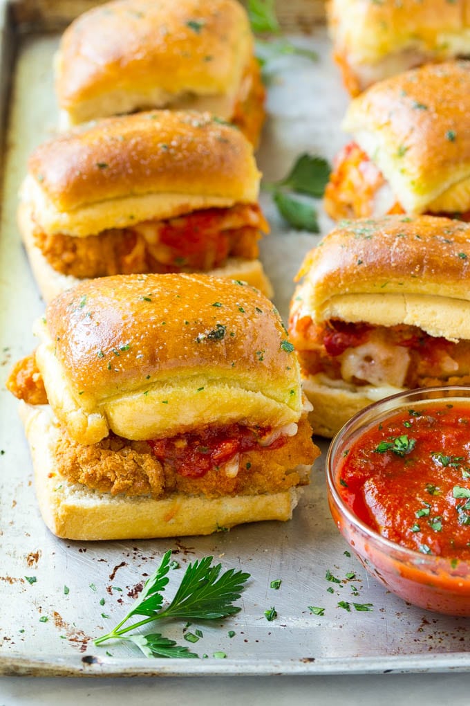 Chicken Parmesan Sliders | Chicken Parmesan Sandwich Recipe | Slider Sandwich Recipe #sliders #chickenparm #chickenparmesan #chickenparmesansliders #dinner #appetizer #uzhal Chicken parmesan sliders made with crispy chicken, marinara sauce and cheese on buns.