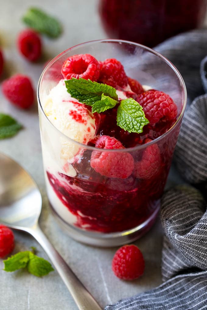 Raspberry Sauce Recipe | Homemade Raspberry Sauce | Raspberry Recipe #raspberries #dessert #uzhal A cup of vanilla ice cream with raspberry sauce and fresh raspberries.