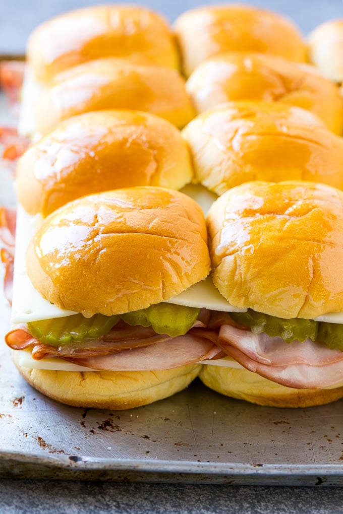 Cuban Sliders Recipe | Cuban Sandwich Recipe | Slider Sandwiches | Ham and Cheese Sliders #sliders #sandwiches #ham #cheese #appetizer #uzhal Assembled slider sandwiches ready to go into the oven.