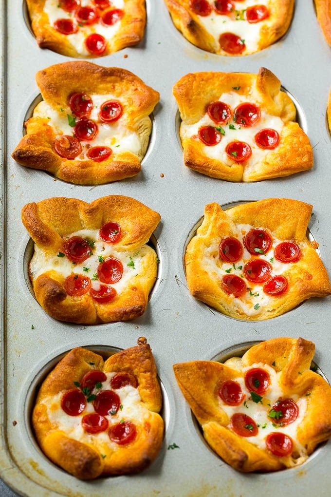 Pizza Muffins Recipe | Pizza Bites | Pizza Cups | Pizza Appetizer #pizza #appetizer #uzhal Savory pizza muffins in a muffin tin.