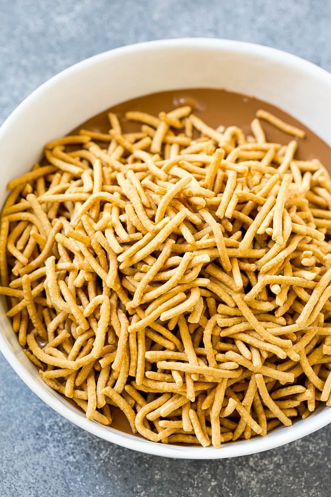Haystack Cookies Recipe | No Bake Cookies | Chow Mein Noodle Cookies #nobakecookies #cookies #recipe #chocolate #uzhal A bowl of melted chocolate and chow mein noodles.