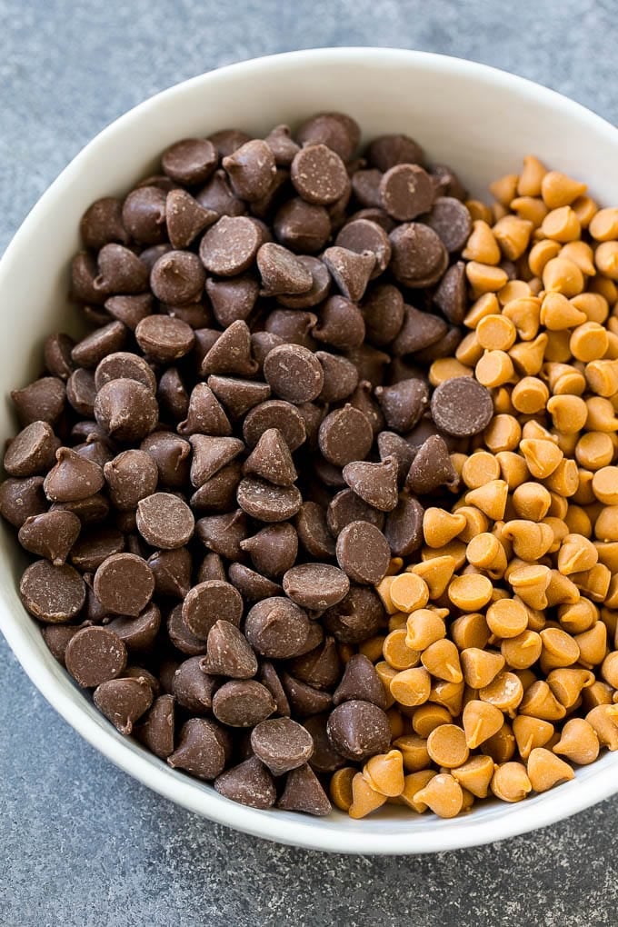 Haystack Cookies Recipe | No Bake Cookies | Chow Mein Noodle Cookies #nobakecookies #cookies #recipe #chocolate #uzhal A mixing bowl of milk chocolate and butterscotch chips.
