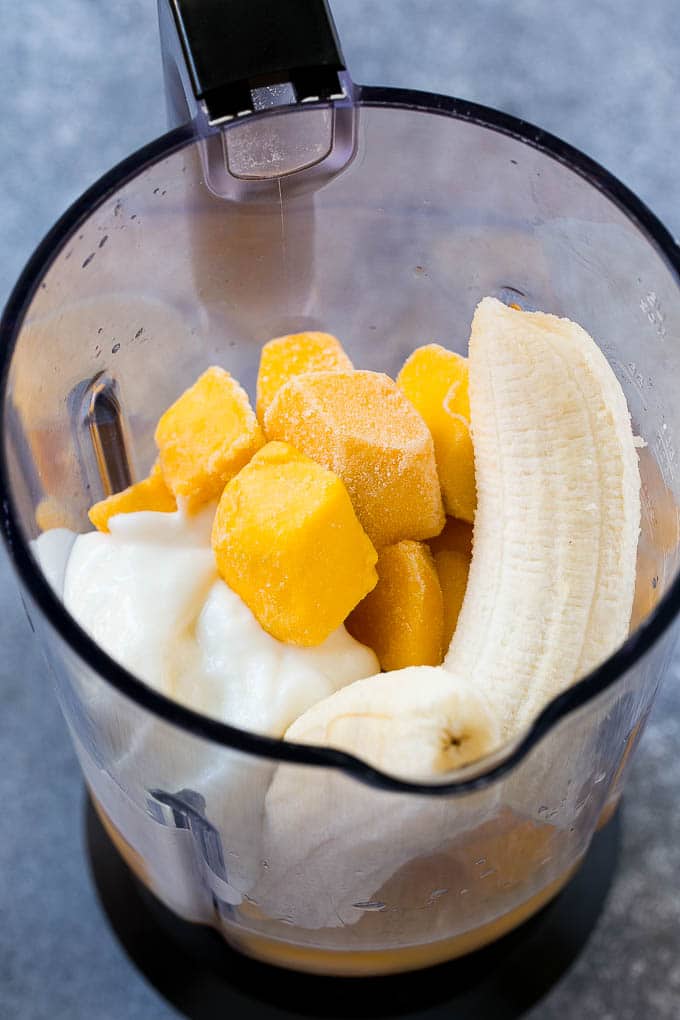 Mango Smoothie Recipe | Mango Recipe | Healthy Smoothie #mango #smoothie #drink #uzhal Fruit, yogurt and juice in a blender.