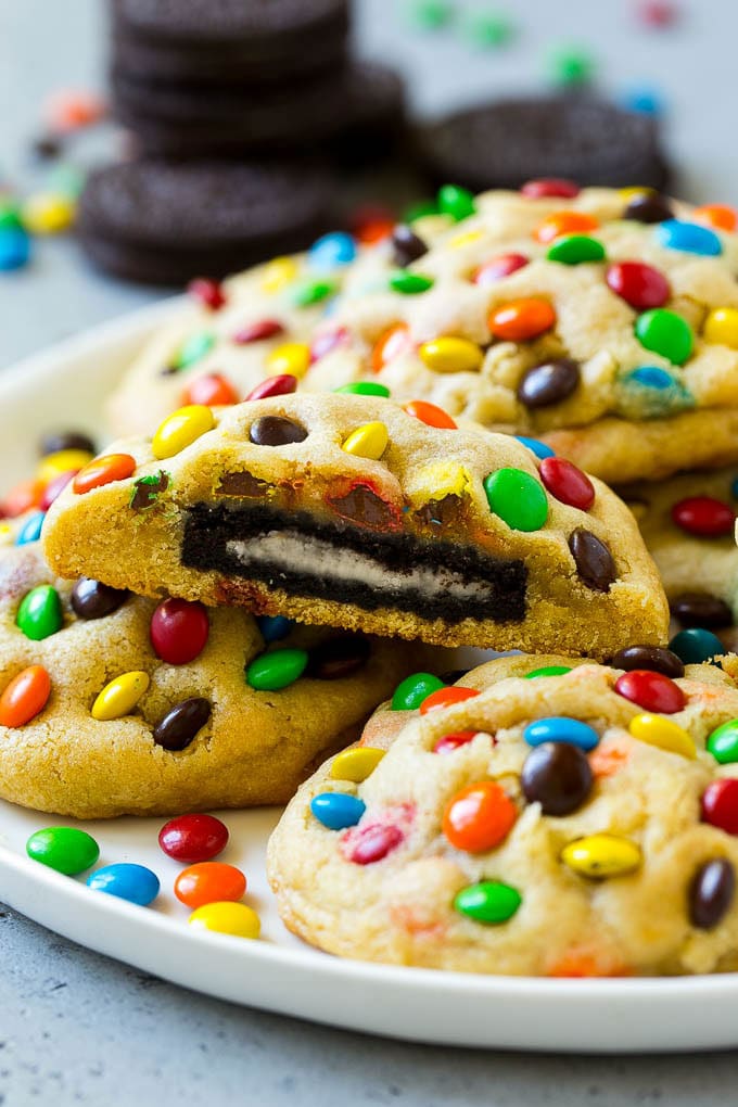 Oreo Stuffed Cookies Recipe | M&M's cookies | Stuffed Cookies #cookies #chocolate #oreos #dessert #baking #uzhal A plate of Oreo stuffed cookies topped with miniature M&M's.