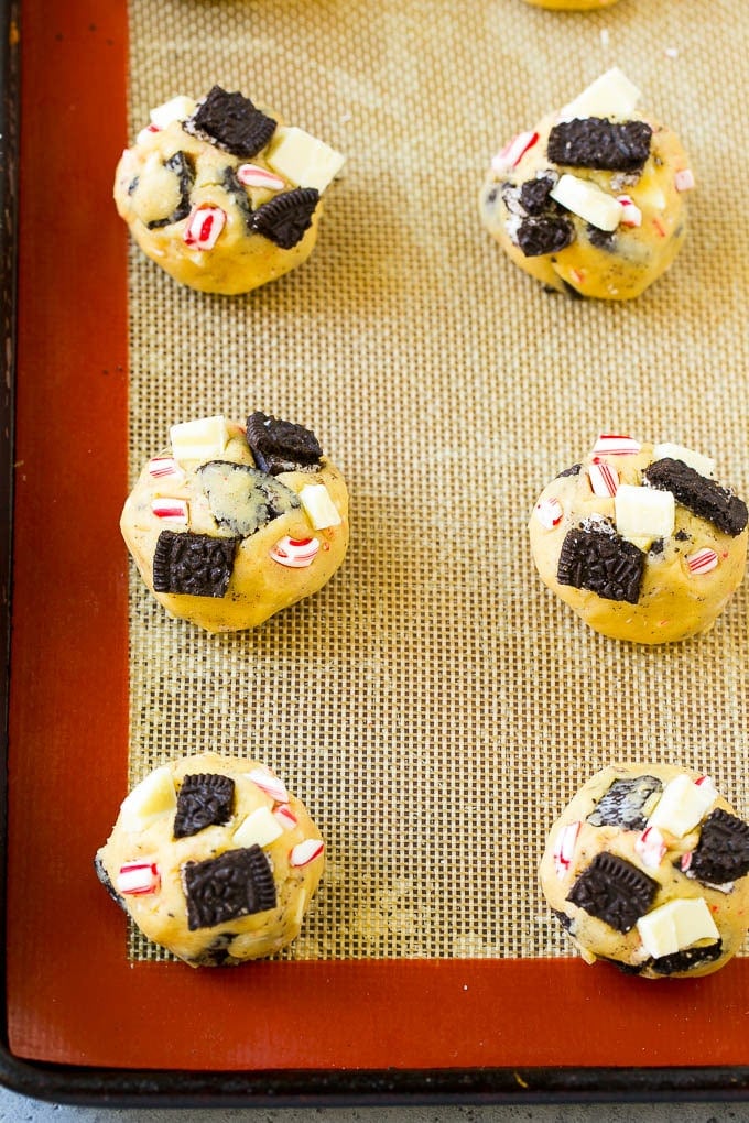 Oreo Peppermint Cookies Recipe | Candy Cane Cookies | Oreo Cookies #oreo #peppermint #cookies #baking #Christmas #sweets #uzhal A sheet pan of unbaked cookies.