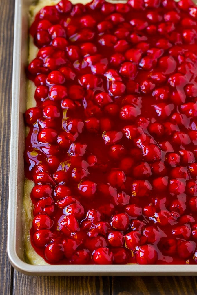 Cherry Bars Recipe | Cherry Pie Bars | Cherry Cookies | Bar Cookies #cookies #bars #cherry #baking #dessert #sweets #uzhal Filling spread over a cookie crust.