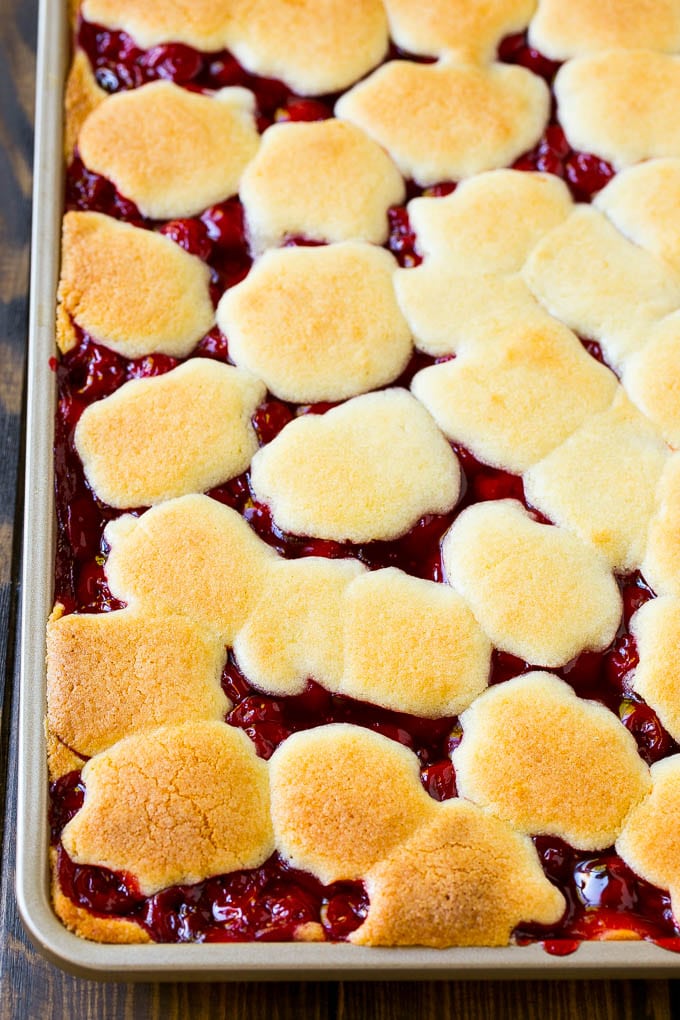 Cherry Bars Recipe | Cherry Pie Bars | Cherry Cookies | Bar Cookies #cookies #bars #cherry #baking #dessert #sweets #uzhal A pan of baked dough and filling.