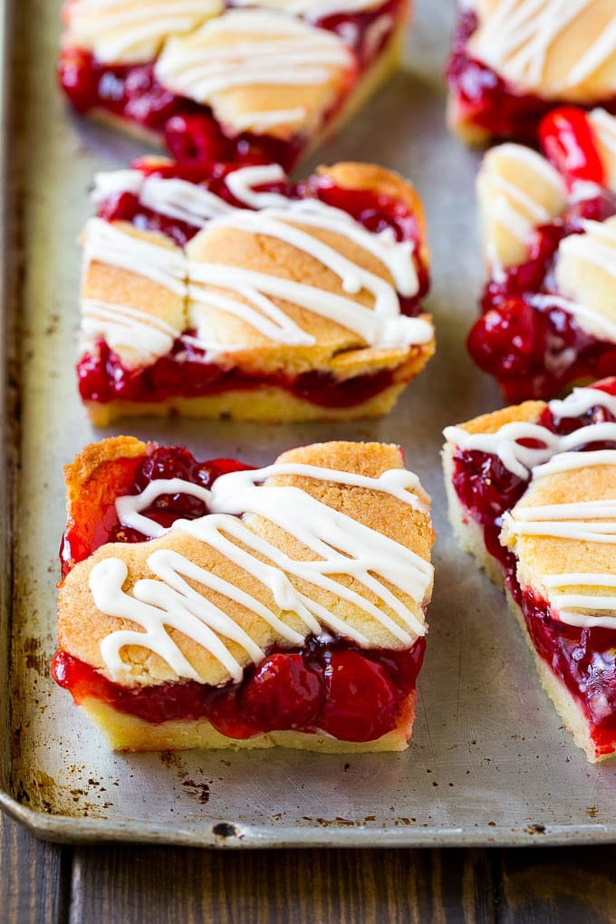 Cherry Bars Recipe | Cherry Pie Bars | Cherry Cookies | Bar Cookies #cookies #bars #cherry #baking #dessert #sweets #uzhal Cherry bars made with almond cookie dough on a sheet pan.