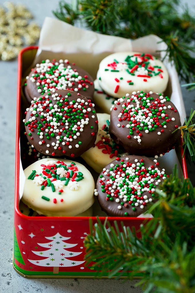 Chocolate Covered Oreos Recipe | Oreo Cookies | Chocolate Dipped Oreos #oreo #cookies #chocolate #sprinkles #dessert #uzhal Christmas chocolate covered Oreos in a gift tin.
