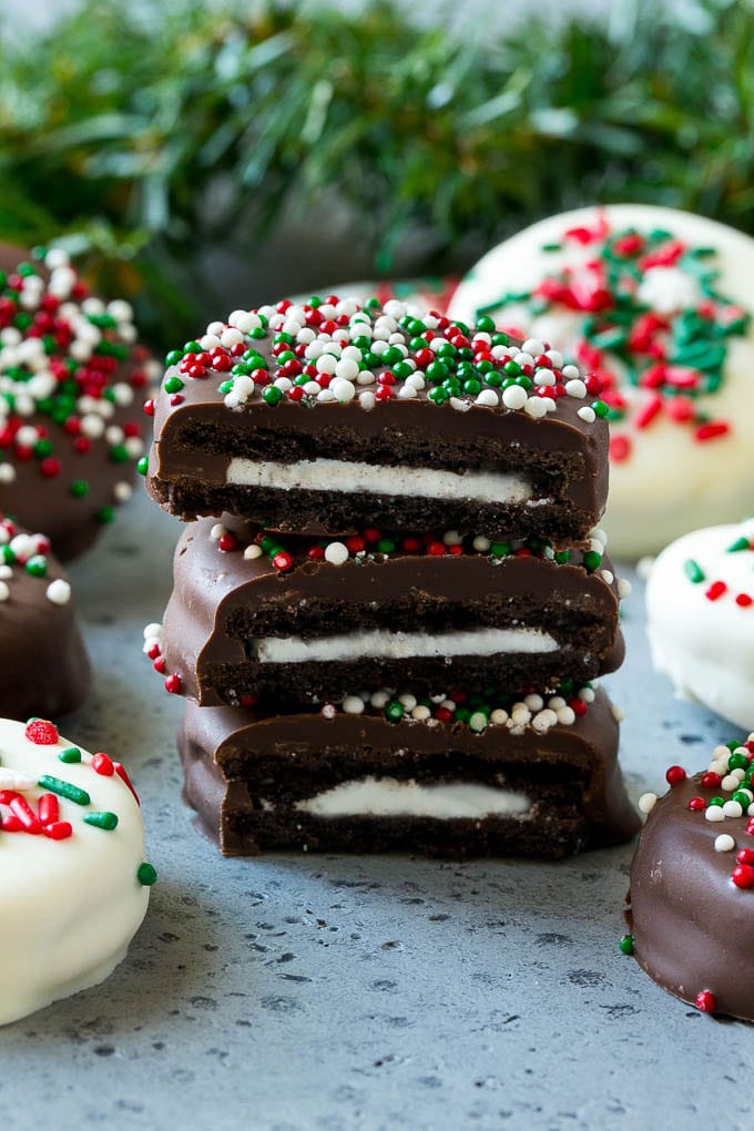 Chocolate Covered Oreos Recipe | Oreo Cookies | Chocolate Dipped Oreos #oreo #cookies #chocolate #sprinkles #dessert #uzhal A stack of chocolate covered Oreos.