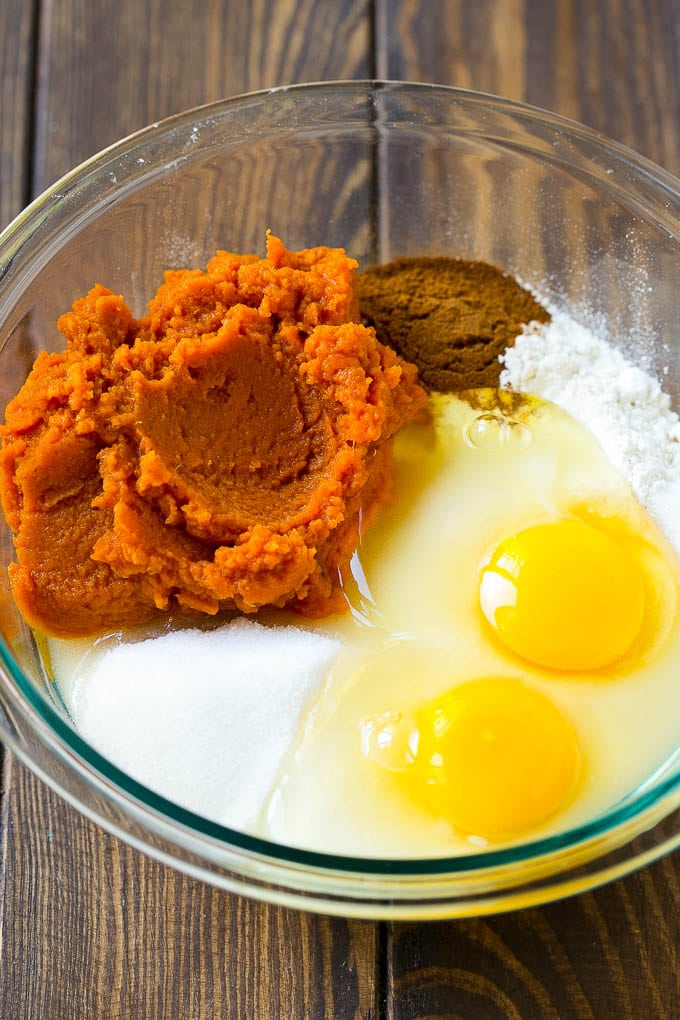 Pumpkin Chocolate Chip Bread Recipe | Pumpkin Bread | Chocolate Pumpkin Bread #pumpkin #bread #fall #chocolate #baking #dessert #uzhal Sugar, eggs, pumpkin puree, flour and spices in a mixing bowl.