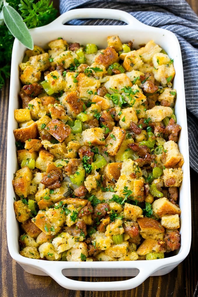 Sausage Stuffing Recipe | Thanksgiving Stuffing | Make Ahead Stuffing #stuffing #thanksgiving #sausage #sidedish #dinner #uzhal A baking dish of sausage stuffing made with Italian sausage, bread cubes and vegetables.