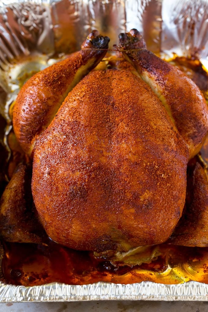Smoked Chicken Recipe | Whole Smoked Chicken | BBQ Chicken #chicken #smoker #BBQ #dinner #uzhal #glutenfree #lowcarb A whole smoked chicken in a roasting pan.