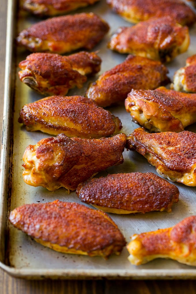 Smoked Chicken Wings | Barbecue Chicken Wings | BBQ Chicken Wings #chicken #wings #bbq #barbecue #appetizer #dinner #uzhal Smoked chicken wings coated in spice rub on a sheet pan.