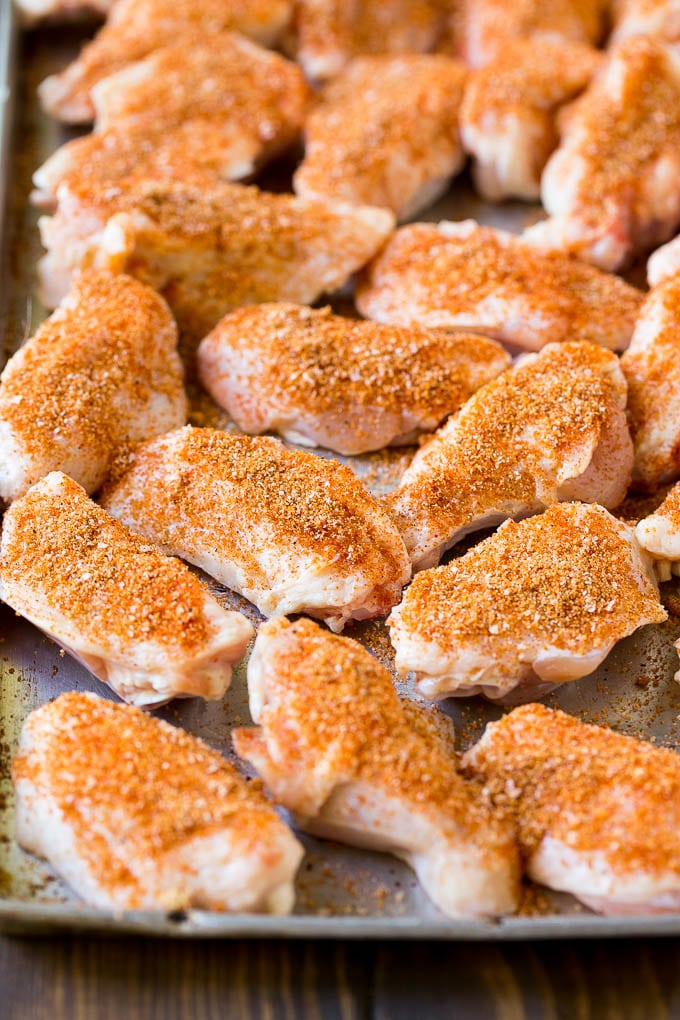 Smoked Chicken Wings | Barbecue Chicken Wings | BBQ Chicken Wings #chicken #wings #bbq #barbecue #appetizer #dinner #uzhal Raw chicken wings coated in homemade spice rub on a sheet pan.