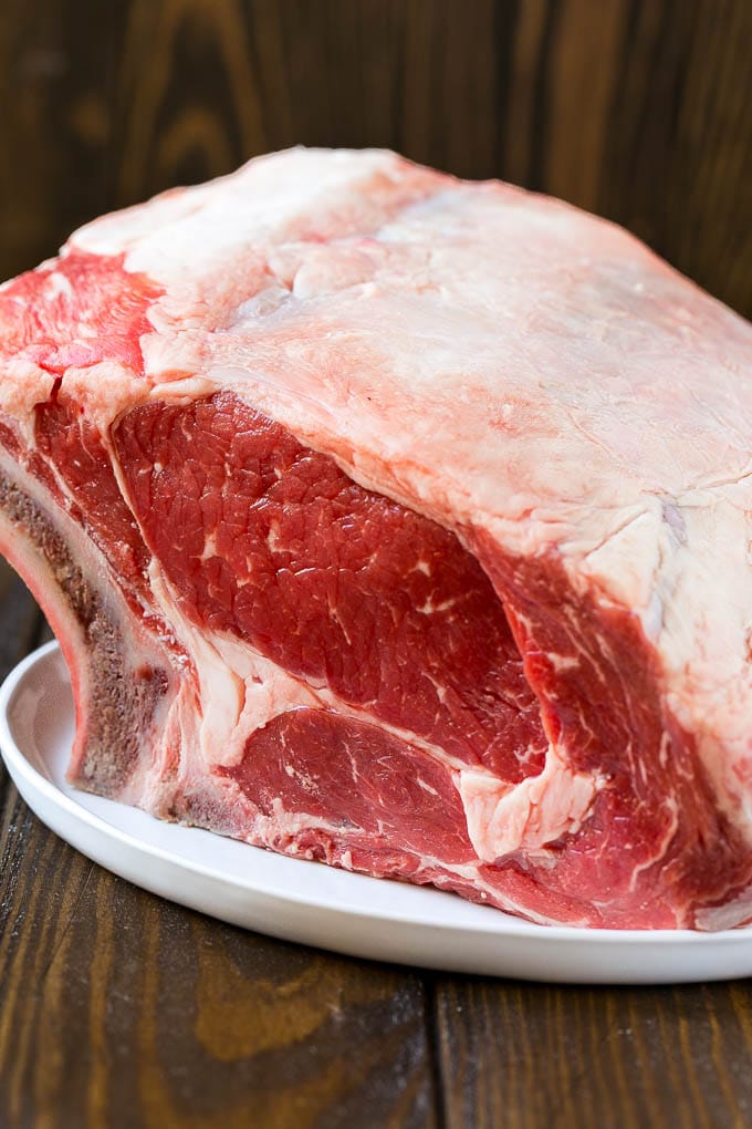 Smoked Prime Rib Recipe | Easy Prime Rib | Smoked Beef | Holiday Prime Rib #primerib #beef #smoker #dinner #uzhal #christmas #thanksgiving #lowcarb #keto An uncooked standing rib roast.