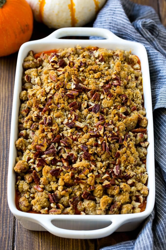 Sweet Potato Casserole with Pecans Recipe | Sweet Potato Casserole | Sweet Potato Side Dish #sweetpotatoes #thanksgiving #pecans #casserole #sidedish #holiday #fall #uzhal Sweet potato casserole with pecans and brown sugar streusel in a baking dish.