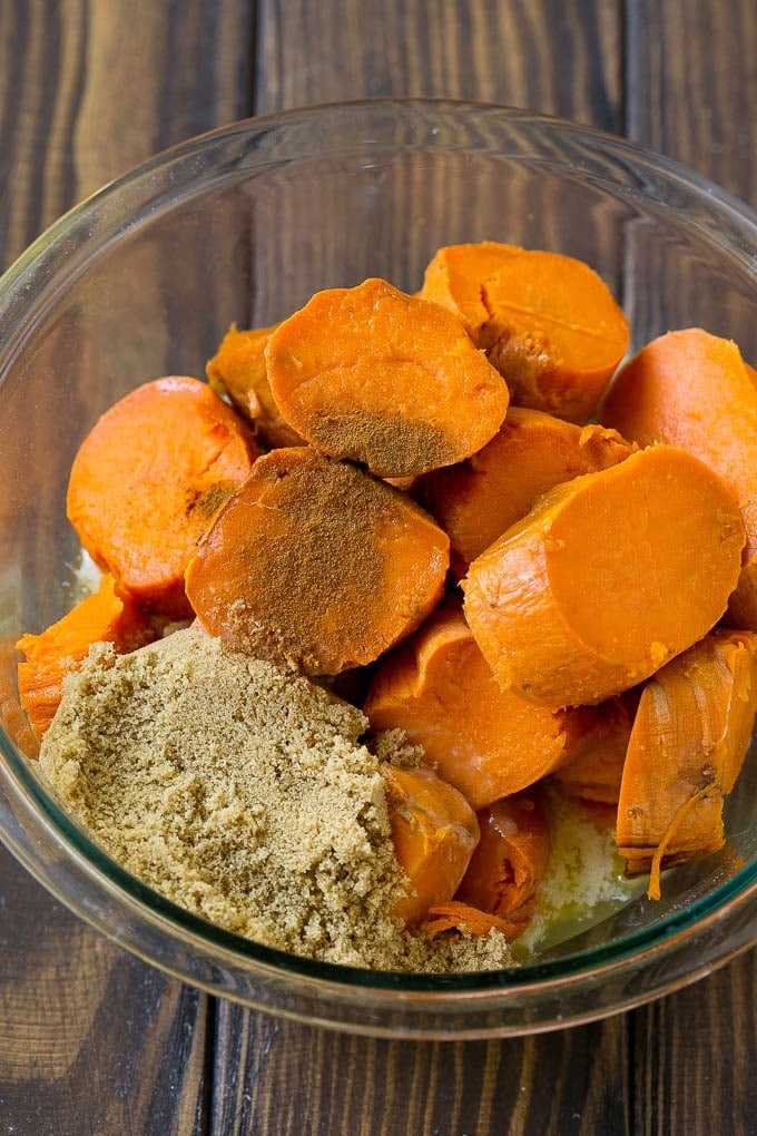 Sweet Potato Casserole with Pecans Recipe | Sweet Potato Casserole | Sweet Potato Side Dish #sweetpotatoes #thanksgiving #pecans #casserole #sidedish #holiday #fall #uzhal Sliced sweet potatoes with brown sugar, butter and spices.