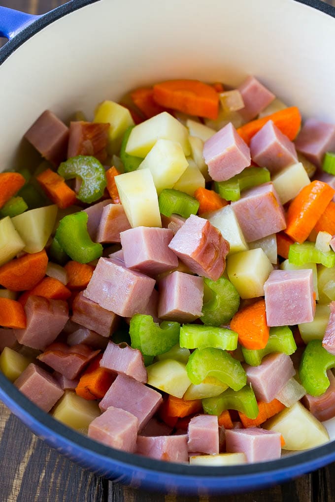 Ham and Potato Soup | Ham Soup | Potato Soup #soup #ham #potato #dinner #comfortfood #uzhal Diced ham, carrots, potatoes and celery in a soup pot.