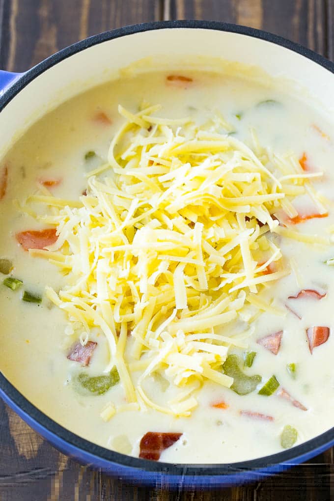 Ham and Potato Soup | Ham Soup | Potato Soup #soup #ham #potato #dinner #comfortfood #uzhal Shredded white cheddar cheese to be stirred into ham and potato soup.