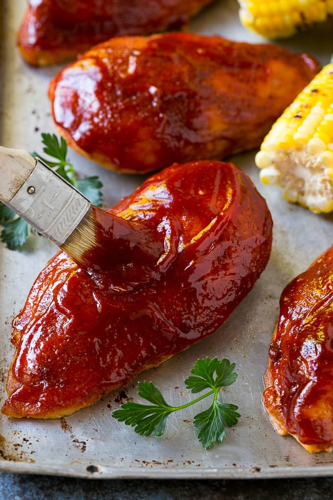 Smoked Chicken Breast Recipe | BBQ Chicken | Smoked Chicken #bbq #chicken #smoker #dinner #glutenfree #uzhal Smoked chicken breasts being brushed with BBQ sauce.