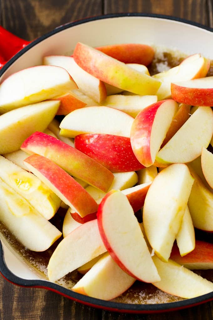 Fried Apples Recipe | Sauteed Apples | Cinnamon Sugar Apples #apples #cinnamon #sugar #sidedish #dessert #uzhal #fall Sliced apples in a pan with butter, sugar and cinnamon.