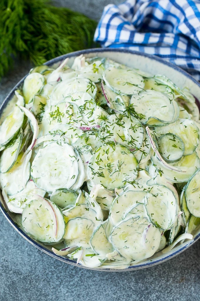 Creamy Cucumber Salad Recipe | German Cucumber Salad | Cucumber Salad #cucumber #salad #dinner #lunch #uzhal #cucumbersalad Creamy cucumber salad with red onion and dill, topped with fresh herbs for garnish.