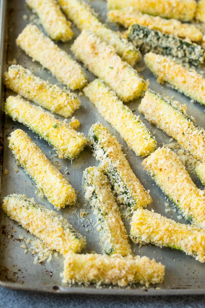 Fried Zucchini Recipe | Zucchini Fries | Zucchini Recipe #appetizer #zucchini #snack #uzhal Sticks coated in egg, parmesan and breadcrumbs.
