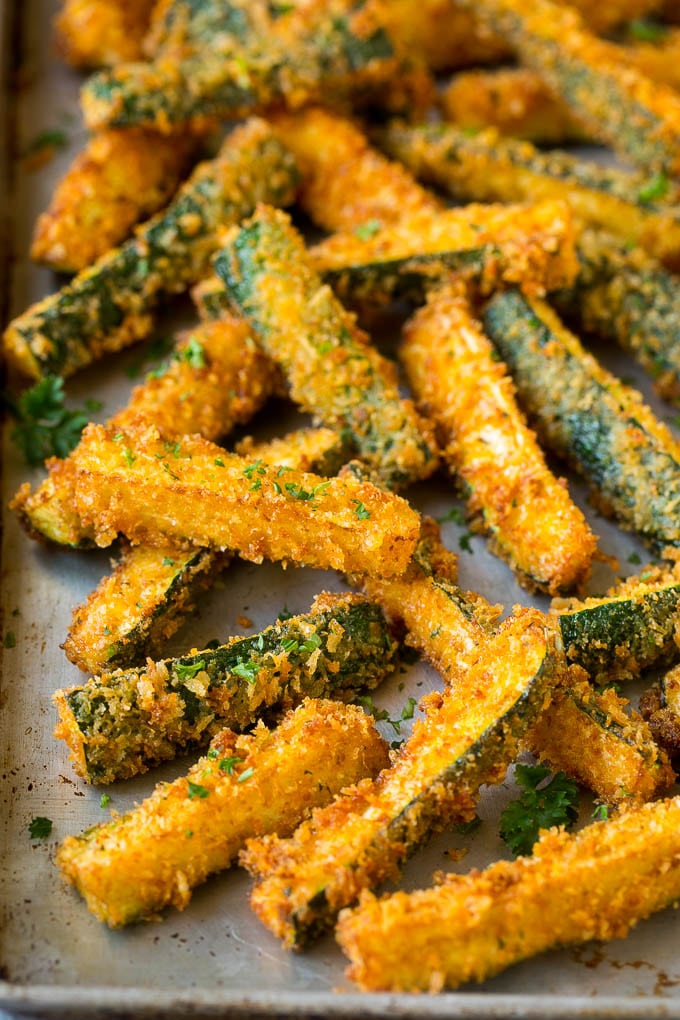 Fried Zucchini Recipe | Zucchini Fries | Zucchini Recipe #appetizer #zucchini #snack #uzhal Fried zucchini sticks on a sheet pan.