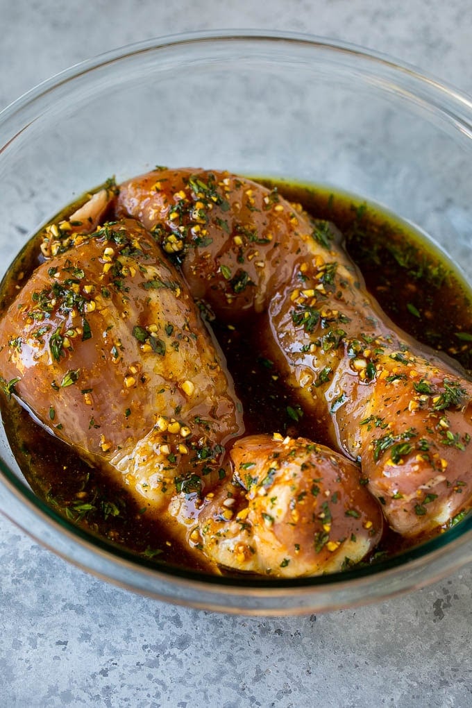 Marinated Pork Tenderloin Recipe | Pork Tenderloin Marinade | Pork Marinade #pork #porktenderloin #marinade #dinner #grilling #uzhal Pork tenderloins in a bowl of marinade.