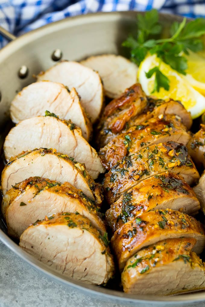 Marinated Pork Tenderloin Recipe | Pork Tenderloin Marinade | Pork Marinade #pork #porktenderloin #marinade #dinner #grilling #uzhal Pork tenderloin marinade with sliced cooked pork in a skillet.