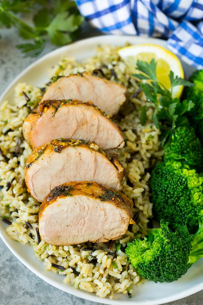 Marinated Pork Tenderloin Recipe | Pork Tenderloin Marinade | Pork Marinade #pork #porktenderloin #marinade #dinner #grilling #uzhal Pork tenderloin marinade over sliced pork, served with rice and broccoli.