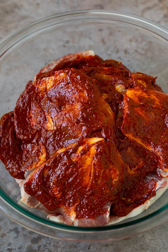 Tacos al Pastor Recipe | Pork Tacos | Mexican Tacos #tacos #pork #pineapple #grilling #tacotuesday #dinner #uzhal Sliced pork shoulder coated in a chile based marinade.