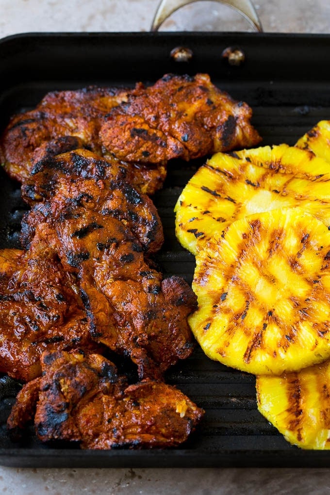 Tacos al Pastor Recipe | Pork Tacos | Mexican Tacos #tacos #pork #pineapple #grilling #tacotuesday #dinner #uzhal Grilled pork and pineapple on a pan.