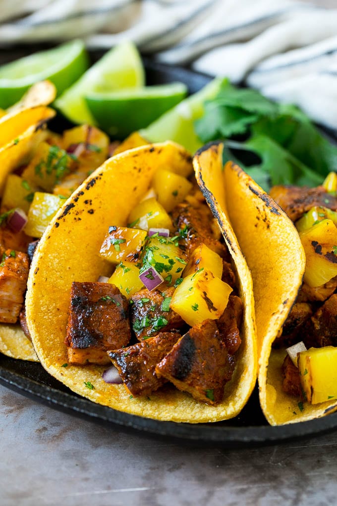 Tacos al Pastor Recipe | Pork Tacos | Mexican Tacos #tacos #pork #pineapple #grilling #tacotuesday #dinner #uzhal Tacos al pastor stuffed with grilled pork, pineapple, red onion and cilantro.