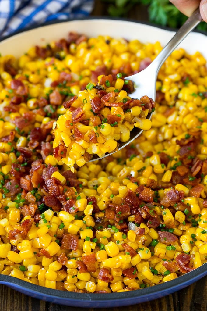 Bacon Fried Corn Recipe | Sauteed Corn | Corn Side Dish #corn #bacon #sidedish #glutenfree #dinner #uzhal A spoonful of fried corn made with bacon and onions.