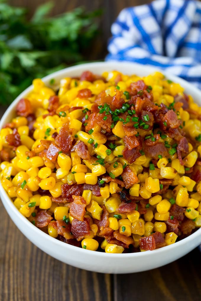 Bacon Fried Corn Recipe | Sauteed Corn | Corn Side Dish #corn #bacon #sidedish #glutenfree #dinner #uzhal A serving bowl of Southern fried corn with bacon.