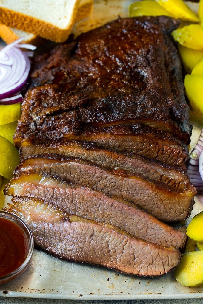 Smoked Brisket Recipe | Beef Brisket | BBQ Beef #brisket #smoker #beef #bbq #dinner #uzhal Smoked brisket sliced and served with pickles, onions and bread.