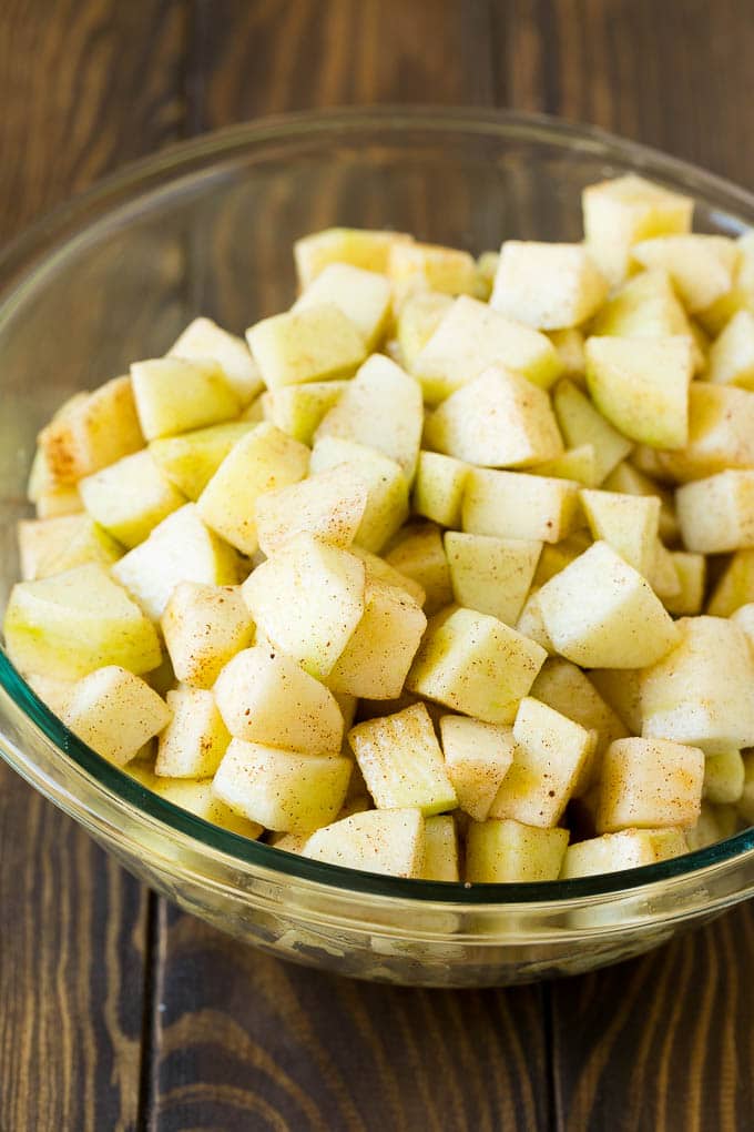 Apple Cobbler Recipe | Apple Dessert #apples #cobbler #dessert #baking #fall #uzhal Diced apples tossed with cinnamon and sugar.