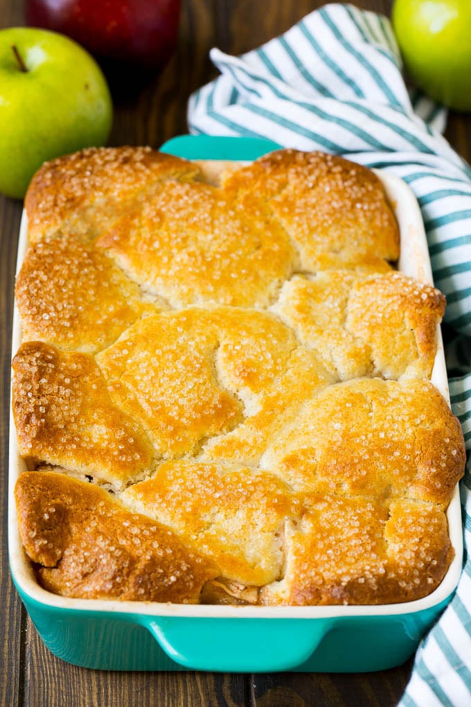 Apple Cobbler Recipe | Apple Dessert #apples #cobbler #dessert #baking #fall #uzhal A dish of baked apple dessert topped with sugar.