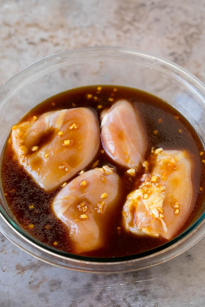 Huli Huli Chicken Recipe | Hawaiian Chicken | Grilled Chicken Thighs #chicken #pineapple #grilling #dinner #uzhal Chicken thighs in a bowl of marinade.