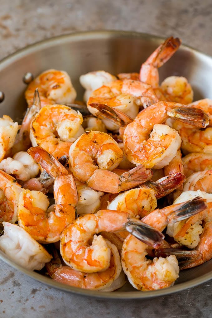 Surf and Turf Recipe | Seared Steak #steak #shrimp #keto #lowcarb #dinner #uzhal Sauteed jumbo shrimp in a skillet.