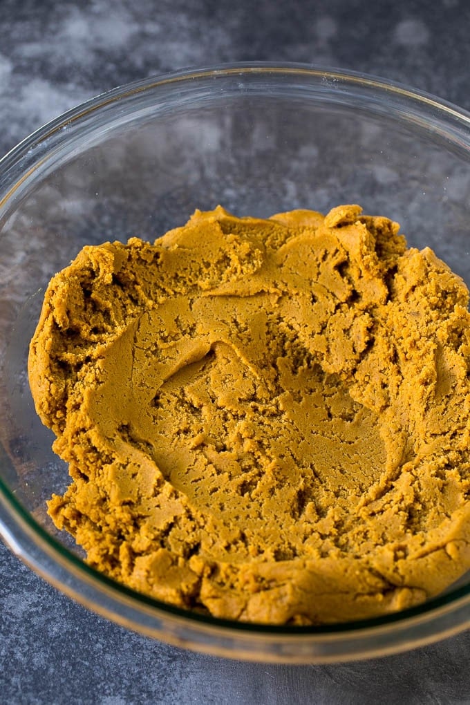 Molasses Cookies Recipe | Spice Cookies #cookies #baking #christmas #dessert #uzhal Cookie dough in a mixing bowl.